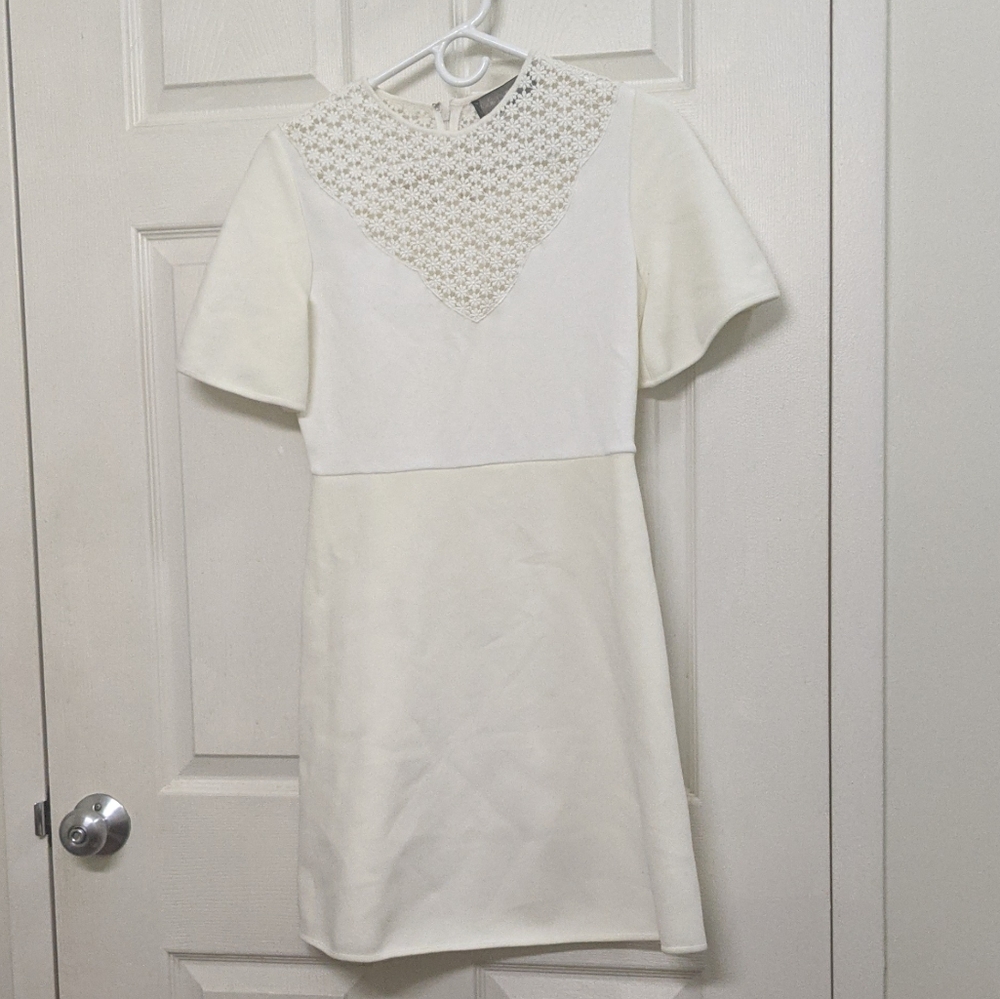 Like New Designer White cream illusion mini dress